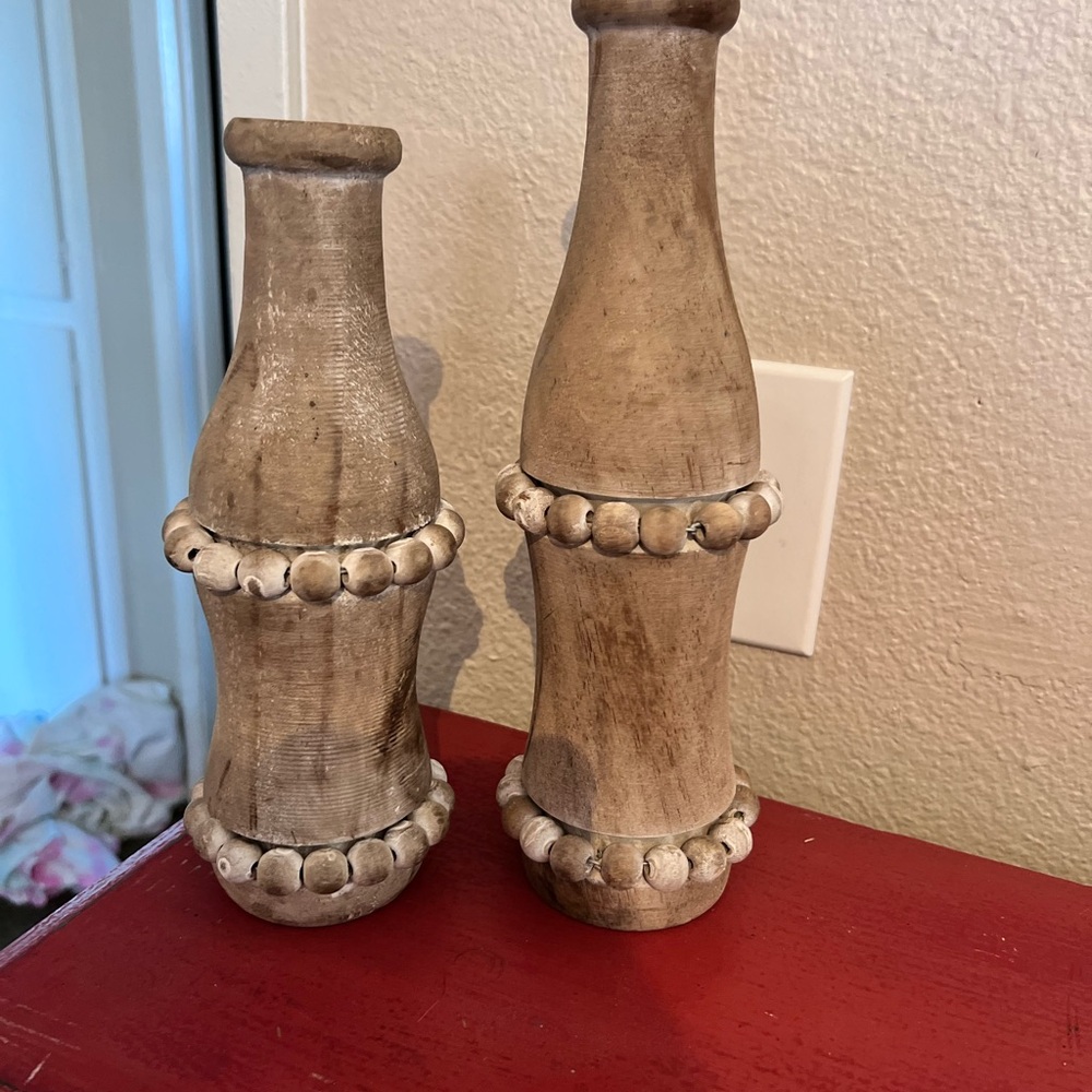 Wood vases tall on is 12” tall short is 10” tall